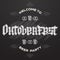 Oktoberfest. Illustration of Bavarian Beer festival on chalkboard with floral elements and wreath. Handwritten Lettering for