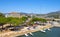 Olbia, Italy - Panoramic view of Olbia port and yacht marina area with piers and Tyrrhenian sea shore and Grand Hotel President
