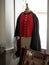 Old 19th century red British military uniform jacket with brass buttons