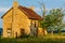 An Old Abandonded Texas Farmhouse with Various Wildflowers