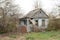 Old abandoned adobe house in the village