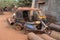 An old abandoned auto rickshaw and a motorbike covered in dust in Bhubaneswar, India