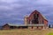 Old Abandoned Barn with Dark Cloudy Day