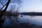 An old abandoned boat. Morning by the river.