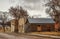 Old abandoned business buildings along a dirt street