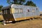 An old abandoned camper or mobile home