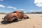 Old and abandoned car in the desert of Namibia, spot known as solitaire.