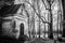 Old abandoned church in the forest Duboe, Belarus. Monotone image.