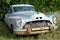 Old Abandoned Classic Vintage American Car in Yard