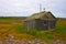 Old abandoned fishermans cabin at White Sea coast, northern Russ