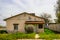 Old Abandoned Home With Overgrown Front Yard