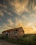 Old abandoned house and the burning sky