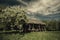 Old abandoned hut under dramatic skies