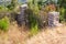 Old abandoned locked stone gate in garden