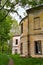 Old abandoned manor house with boarded up windows