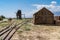 Old abandoned oil well and storage sheds, part of the former Laws Railroad in Inyo County California