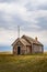 An old abandoned one room school house on the prairie of North Dakota