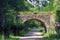 Old abandoned railway bridge in Romincka forest, Kaliningrad region, Russia