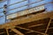 Old Abandoned Rusted Train Overpass with Restricted Clearance Sign