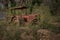 An old abandoned rusty derelict tractor