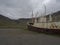 Old abandoned rusty fishing boat ship wreck standing on the sand