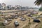 Old, abandoned, scrap vehicles scattered on the banks of Mutha river.