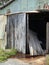 Old abandoned tin and timber shed in Strahan