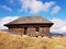 Old abandoned traditional rustic wood house. Fundata Romania