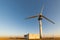 Old abandoned wind turbines in the desert landscape