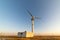 Old abandoned wind turbines in the desert landscape