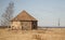 An old, abandoned windmill with a tiled roof