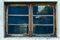 Old abandoned window, detail of a window of a house