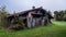 Old abandoned wooden barn in a meadow in Bresse, France