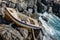 Old abandoned wooden boat crashed on rocks of Santorini island