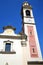 Old abstract wall and church tower bell sunny day tradate