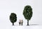 Old age miniature people walking between miniature trees.