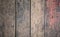 Old aged color painted textured rough natural wooden fence floor wall panel board background in interior decoration architectural