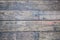 Old aged color painted textured rough natural wooden fence floor wall panel board background in interior decoration architectural