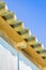 Old aged dangerous roof of a wooden shack made of prefabricated corrugated panels