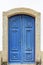 Old and aged historic wooden blue church door