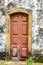 Old and aged historic wooden church door