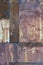 Old aged weathered rusty corroded coat iron sheets texture pattern, multiple vertical rusted corroding grunge metal patch plates