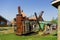 Old agricultural tools on display at an outdoor museum in northern canada