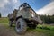 Old all terrain truck with big protector rubber tires for off road use