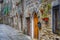 Old alley with doors to the houses