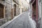 Old alleyway in the small town of Joyeuse, France