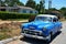 Old American car in Puerto Esperanza, Cuba