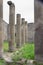 Old ancient ruined Italian Roman Pompei, vertical columns, walls