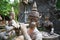 Old ancient stone statues in Secret Buddhism Magic Garden, Koh Samui, Thailand