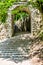 Old Ancient vintage castle stone stairs with trees and forest.